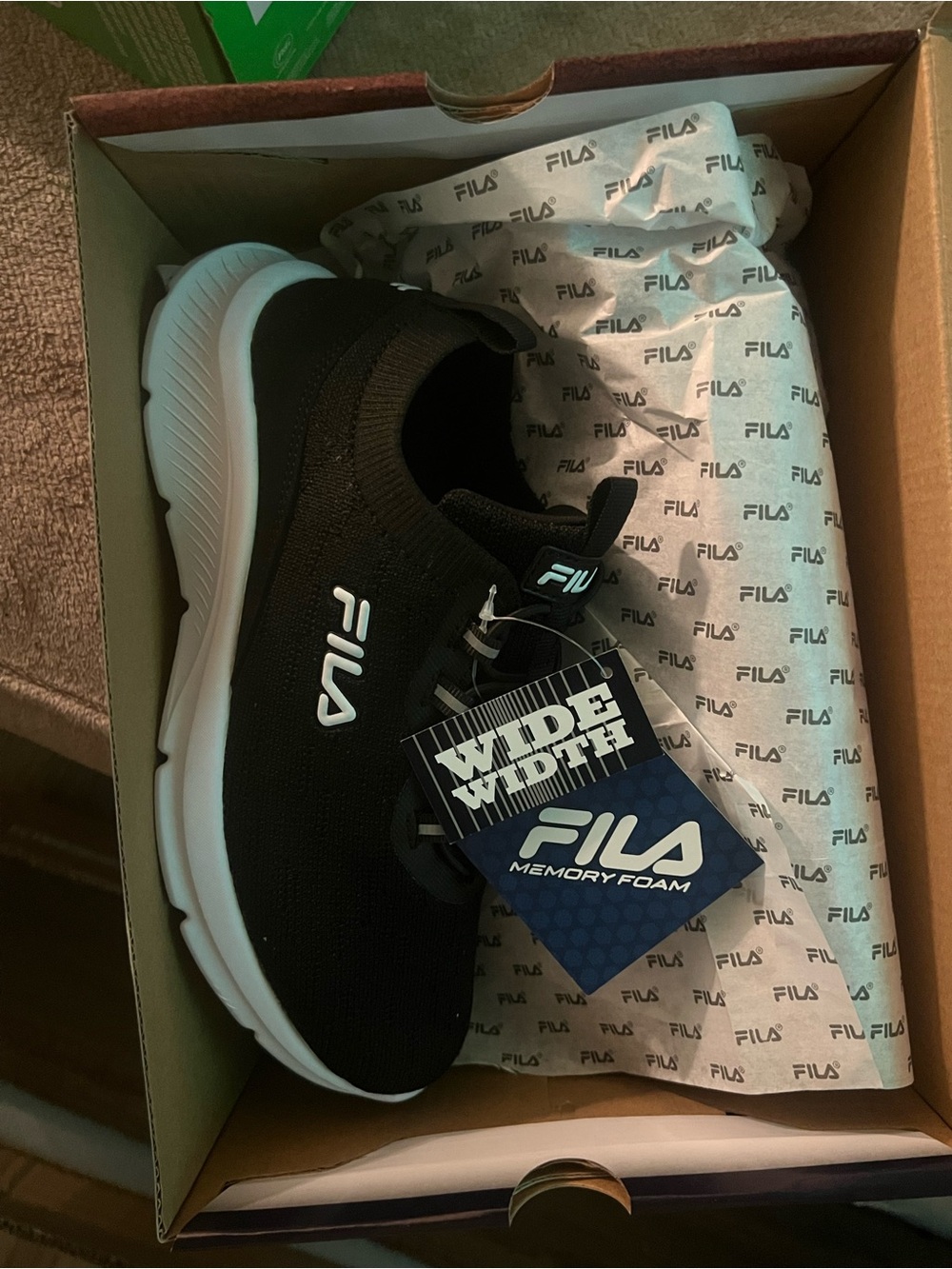 Fila Men's Black and White Slip-On Athletic Shoe